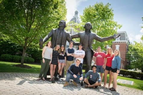 Students pose for pictures with the statues of George Washington and Thomas Jefferson during the Creosote Affects photo shoot May 1, 2019年华盛顿 & Jefferson College.